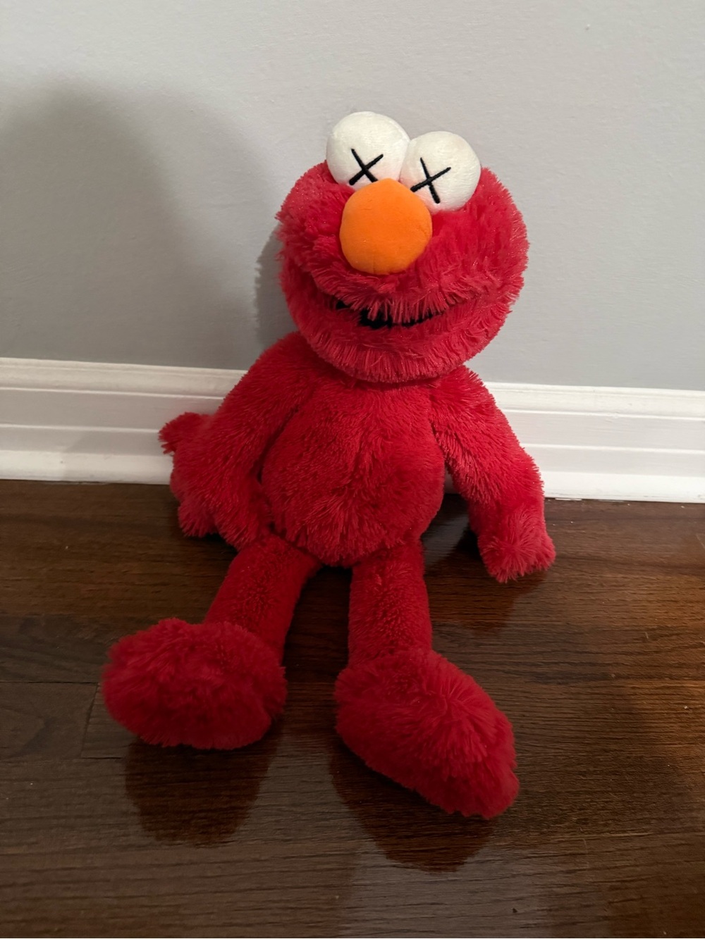 Kaws x Uniqlo Sesame Street collection (Elmo)